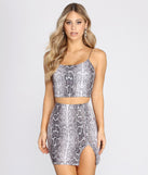 With fun and flirty details, Sequin Snake Print Crop Top shows off your unique style for a trendy outfit for the summer season!