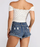 With fun and flirty details, Flower Girl Lace Up Crop Top - 060012211999 shows off your unique style for a trendy outfit for the summer season!
