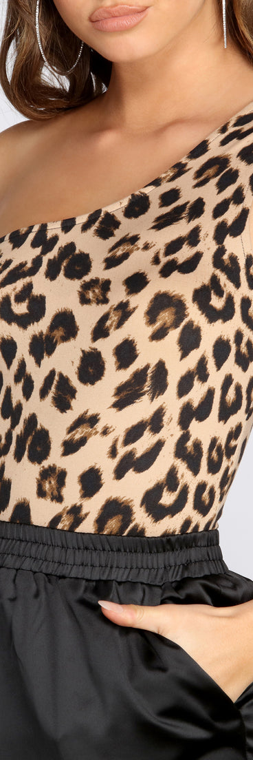 Dress up in Leopard Print One Shoulder Bodysuit as your going-out dress for holiday parties, an outfit for NYE, party dress for a girls’ night out, or a going-out outfit for any seasonal event!