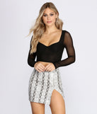 With fun and flirty details, Sultry Stunner Crop Top shows off your unique style for a trendy outfit for the summer season!