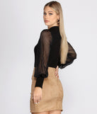 With fun and flirty details, Sheer Balloon Sleeve Mock Neck Top shows off your unique style for a trendy outfit for the summer season!