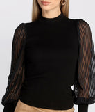 With fun and flirty details, Sheer Balloon Sleeve Mock Neck Top shows off your unique style for a trendy outfit for the summer season!