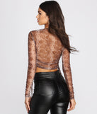With fun and flirty details, Sultry Sheer Snake Print Crop Top shows off your unique style for a trendy outfit for the summer season!