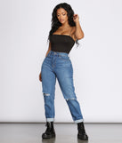 Only The Basics Black Cami Top Outfit styled with Layered Necklaces, Cuffed Denim Jeans, and Black Combat Boots
