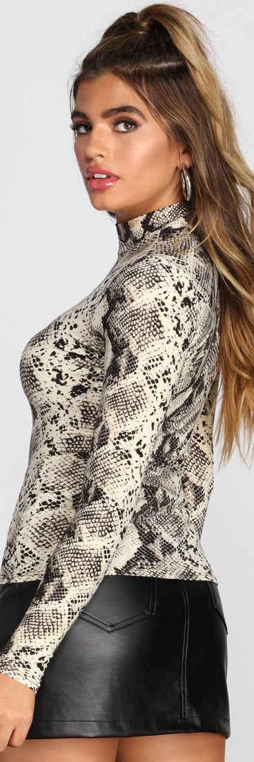 With fun and flirty details, Snake Print Mock Neck Knit Top shows off your unique style for a trendy outfit for the summer season!
