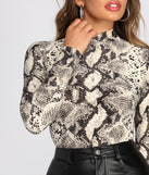 With fun and flirty details, Snake Print Mock Neck Knit Top shows off your unique style for a trendy outfit for the summer season!