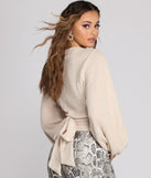 With fun and flirty details, Textured Knit Wrap Front Top shows off your unique style for a trendy outfit for the summer season!