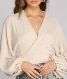 With fun and flirty details, Textured Knit Wrap Front Top shows off your unique style for a trendy outfit for the summer season!