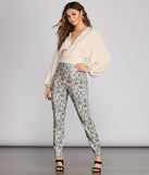 With fun and flirty details, Textured Knit Wrap Front Top shows off your unique style for a trendy outfit for the summer season!