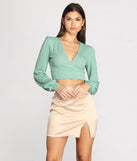 With fun and flirty details, Wrap Front Bishop Sleeve Crop Top shows off your unique style for a trendy outfit for the summer season!