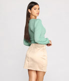 With fun and flirty details, Wrap Front Bishop Sleeve Crop Top shows off your unique style for a trendy outfit for the summer season!