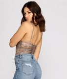 With fun and flirty details, Such A Sultry Stunner Bodysuit shows off your unique style for a trendy outfit for the summer season!