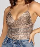 With fun and flirty details, Such A Sultry Stunner Bodysuit shows off your unique style for a trendy outfit for the summer season!