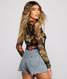 With fun and flirty details, Tropical Long Sleeve Mesh Crop Top shows off your unique style for a trendy outfit for the summer season!