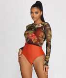 With fun and flirty details, Tropical Long Sleeve Mesh Crop Top shows off your unique style for a trendy outfit for the summer season!