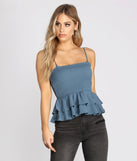 With fun and flirty details, Smocked Over You Ruffled Top shows off your unique style for a trendy outfit for the summer season!