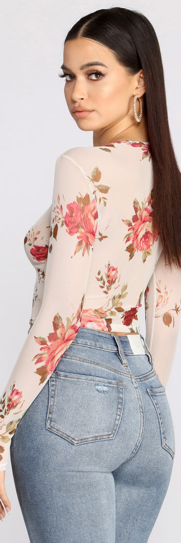 With fun and flirty details, Sweet Floral Mesh Crop Top shows off your unique style for a trendy outfit for the summer season!