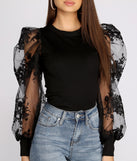 With fun and flirty details, A Chic Moment Sheer Floral Sleeve Top shows off your unique style for a trendy outfit for the summer season!