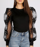 With fun and flirty details, A Chic Moment Sheer Floral Sleeve Top shows off your unique style for a trendy outfit for the summer season!