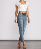 Basic Little White Drawstring Crop Top Outfit styled with Tapered Denim Jeans
