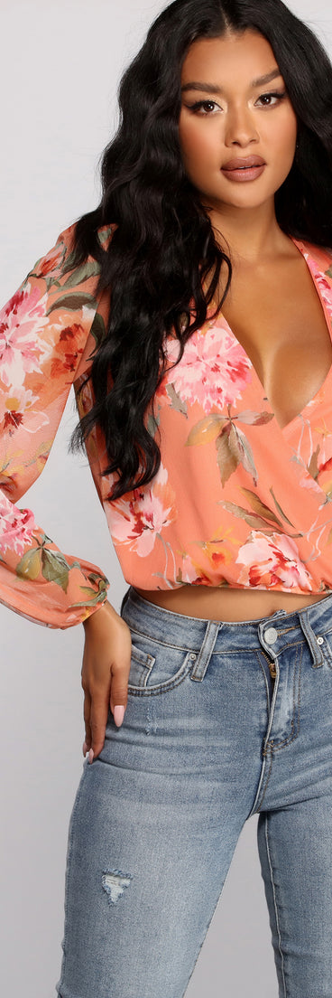 With fun and flirty details, Floral Rush Surplice Mesh Top shows off your unique style for a trendy outfit for the summer season!
