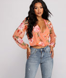 With fun and flirty details, Floral Rush Surplice Mesh Top shows off your unique style for a trendy outfit for the summer season!