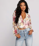 The trendy Floral Rush Surplice Mesh Top is the perfect pick to create a holiday outfit, new years attire, cocktail outfit, or party look for any seasonal event!