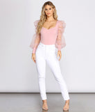 With fun and flirty details, Essential Organza Puff Sleeve Bodysuit shows off your unique style for a trendy outfit for the summer season!