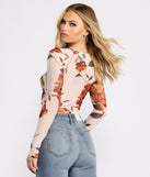 With fun and flirty details, Lookin' Fine In Floral Mesh Crop Top shows off your unique style for a trendy outfit for the summer season!
