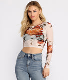 With fun and flirty details, Lookin' Fine In Floral Mesh Crop Top shows off your unique style for a trendy outfit for the summer season!