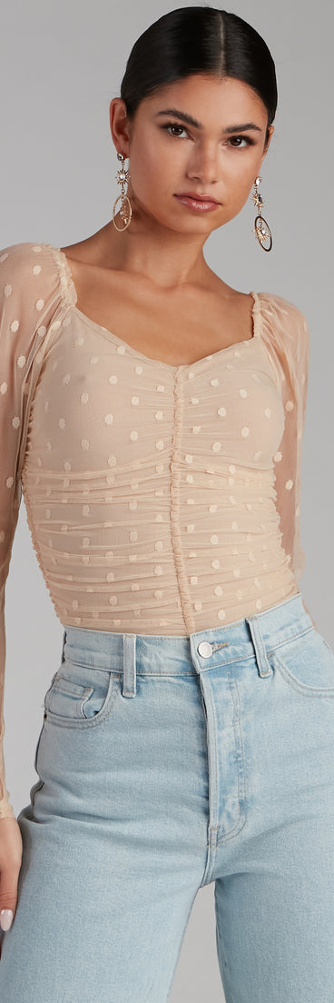 The trendy On Point Polka Dot Bodysuit is the perfect pick to create a holiday outfit, new years attire, cocktail outfit, or party look for any seasonal event!