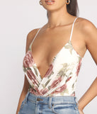 With fun and flirty details, All My Love Floral Mesh Bodysuit shows off your unique style for a trendy outfit for the summer season!