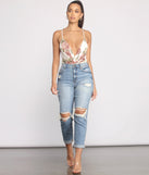 With fun and flirty details, All My Love Floral Mesh Bodysuit shows off your unique style for a trendy outfit for the summer season!
