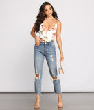 With fun and flirty details, Floral Babe Spaghetti Strap Bodysuit shows off your unique style for a trendy outfit for the summer season!