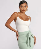 With fun and flirty details, Basic Sleeveless Strappy Back Ribbed Knit Bodysuit shows off your unique style for a trendy outfit for the summer season!