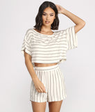 With fun and flirty details, Sweet Stripes Dolman Sleeve Crop Top shows off your unique style for a trendy outfit for the summer season!