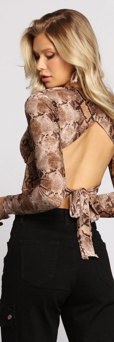 With fun and flirty details, Style It Up Snake Print Crop Top shows off your unique style for a trendy outfit for the summer season!