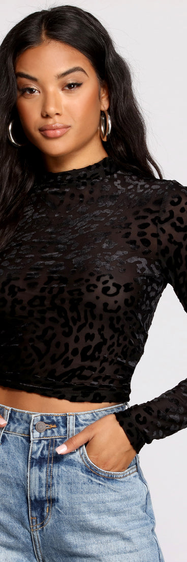 Dress up in Sassy Stunner Flocked Leopard Print Crop Top as your going-out dress for holiday parties, an outfit for NYE, party dress for a girls’ night out, or a going-out outfit for any seasonal event!