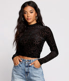Dress up in Sassy Stunner Flocked Leopard Print Crop Top as your going-out dress for holiday parties, an outfit for NYE, party dress for a girls’ night out, or a going-out outfit for any seasonal event!