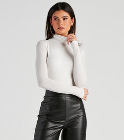The trendy Basic Long Sleeve Crepe Turtleneck Bodysuit is the perfect pick to create a holiday outfit, new years attire, cocktail outfit, or party look for any seasonal event!
