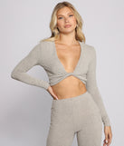 With fun and flirty details, Trendy Twist Ribbed Knit Crop Top shows off your unique style for a trendy outfit for the summer season!