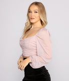 With fun and flirty details, Glitter Lurex Puff Sleeve Crop Top shows off your unique style for a trendy outfit for the summer season!