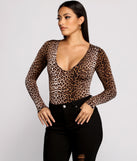 With fun and flirty details, Instincts Unleashed Long Sleeve Bodysuit shows off your unique style for a trendy outfit for the summer season!