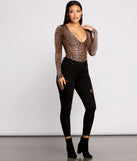 With fun and flirty details, Instincts Unleashed Long Sleeve Bodysuit shows off your unique style for a trendy outfit for the summer season!