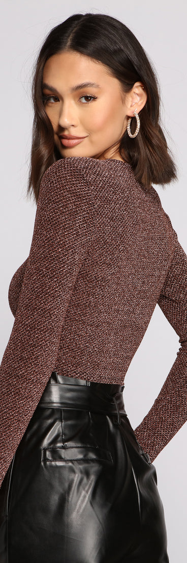 With fun and flirty details, Glimmer Girl Long Sleeve Crop Top shows off your unique style for a trendy outfit for the summer season!