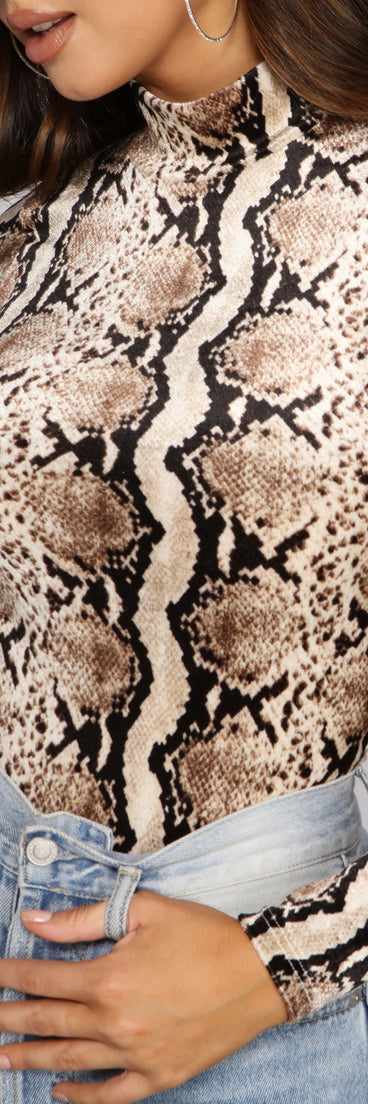 Dress up in Velvet Snake Print Mock Neck Bodysuit as your going-out dress for holiday parties, an outfit for NYE, party dress for a girls’ night out, or a going-out outfit for any seasonal event!