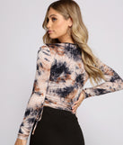 With fun and flirty details, Tie Dye Jersey Knit Crop Top shows off your unique style for a trendy outfit for the summer season!