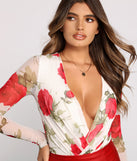 With fun and flirty details, Floral Passion Surplice Mesh Bodysuit shows off your unique style for a trendy outfit for the summer season!