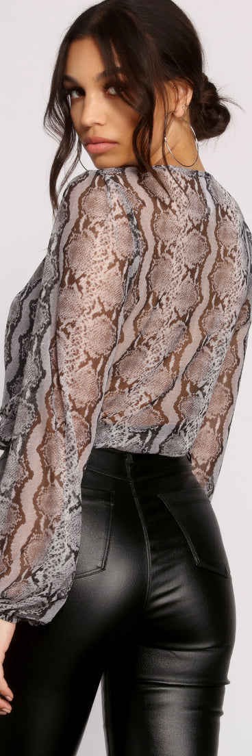 With fun and flirty details, Viper Vixen Snake Print Mesh Top shows off your unique style for a trendy outfit for the summer season!