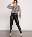 With fun and flirty details, Viper Vixen Snake Print Mesh Top shows off your unique style for a trendy outfit for the summer season!